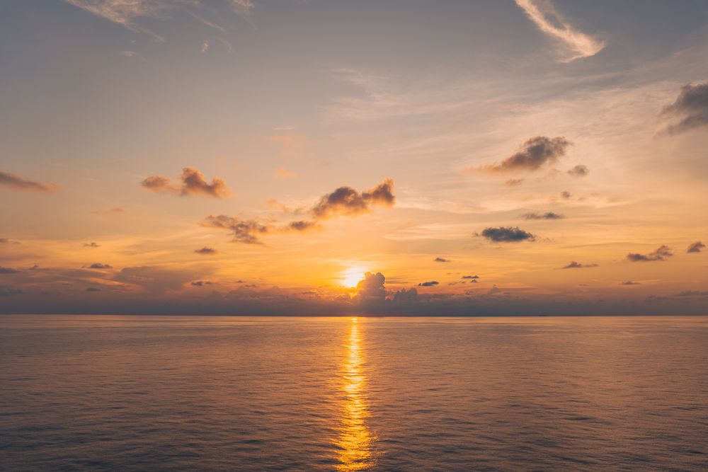 Sunset over open water, photograph 1