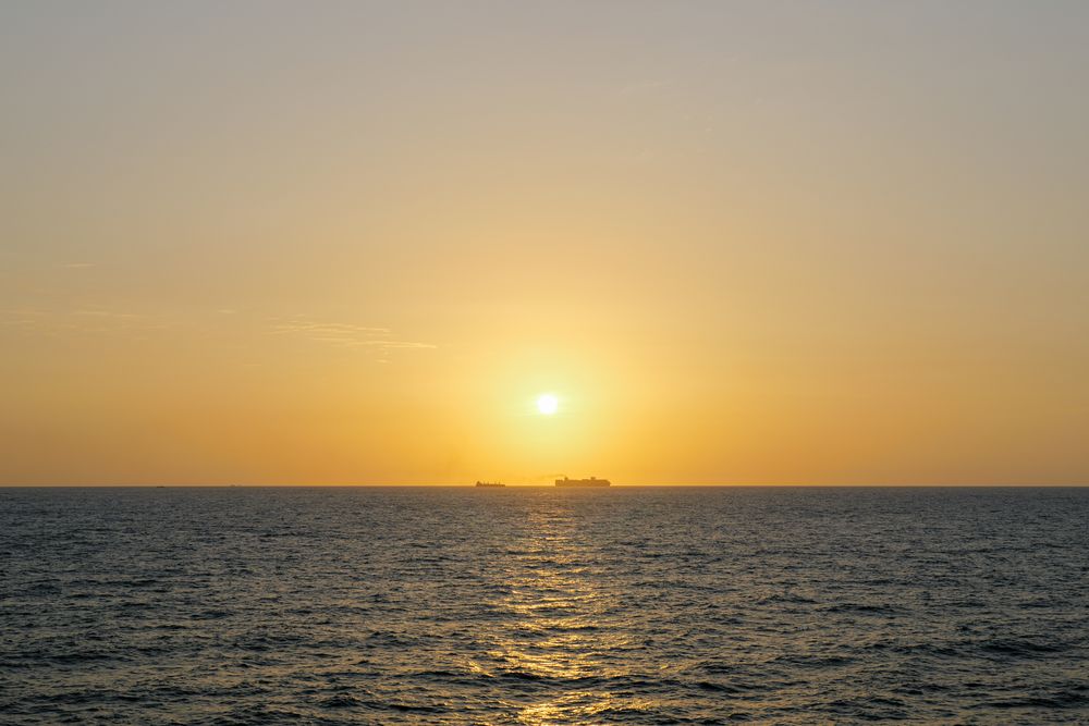 Sunset over open water, photograph 5
