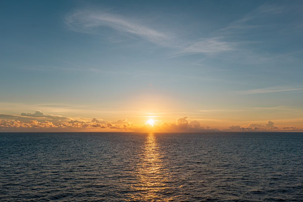 Sunset over open water, photograph 6